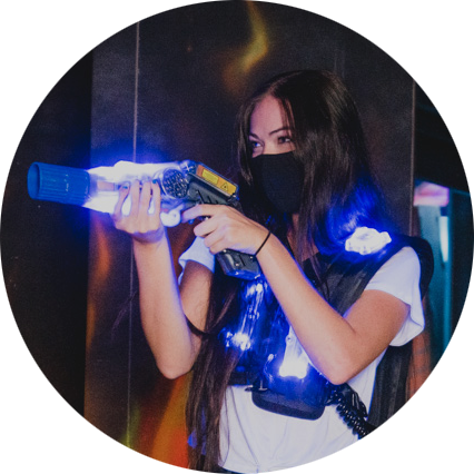 woman playing laser tag.